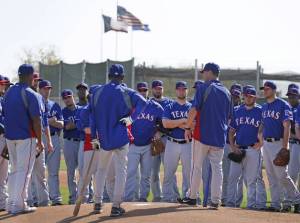 Washington addresses team on first day of workouts.